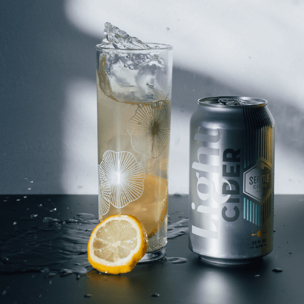 LIght Cider can and glass