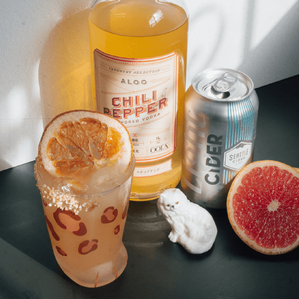 Salty Cat cocktail image with light cider can